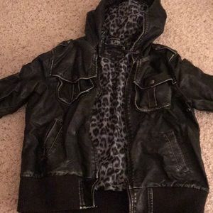 Black leather jacket with cheetah print inside